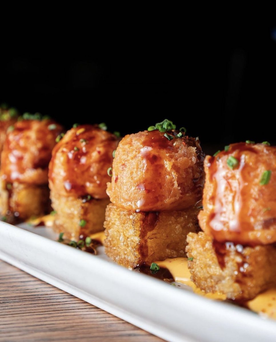Warning: Our Spicy Tuna Tartare on Crispy Rice may cause intense pleasure and cravings. ⚠️