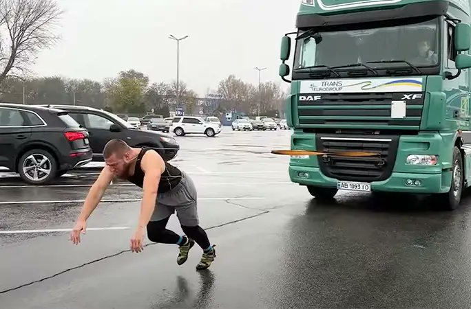 Ukrainian strongman pulls a 2.5-tonne minibus with beard to set a world record.

The 35-year-old man performed all three feats using his beard, neck and teeth
Vehicle pulled by the neck – 7,760 kg
Most cars pulled with the teeth – 7
Source: Guinness World Record
Image Credit: GWR