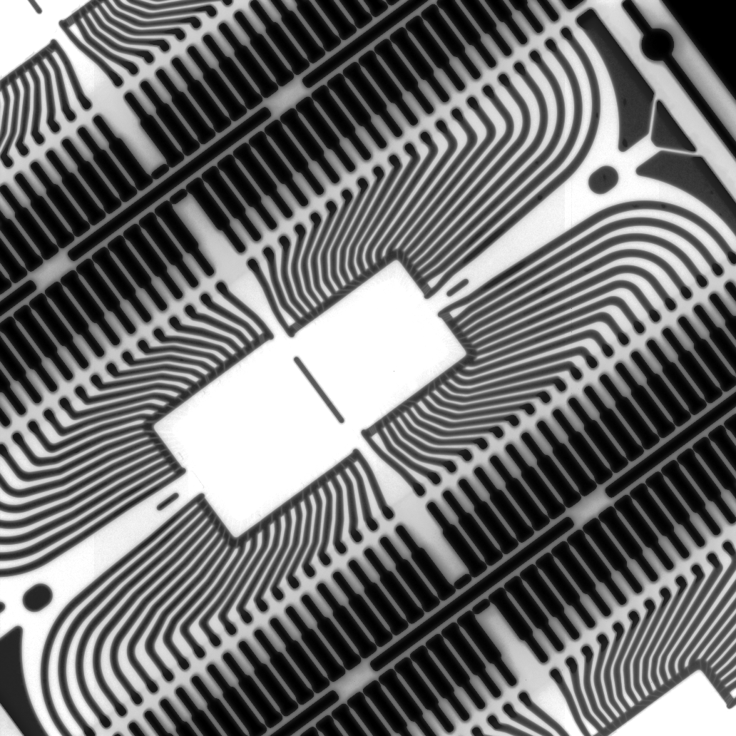 This is an X-ray of an uncut DIP chip, a little strange because it hold two dice instead of one. I can't quite fit it onto my machine's digital sensor, so I'll need to reshoot this on film tomorrow.