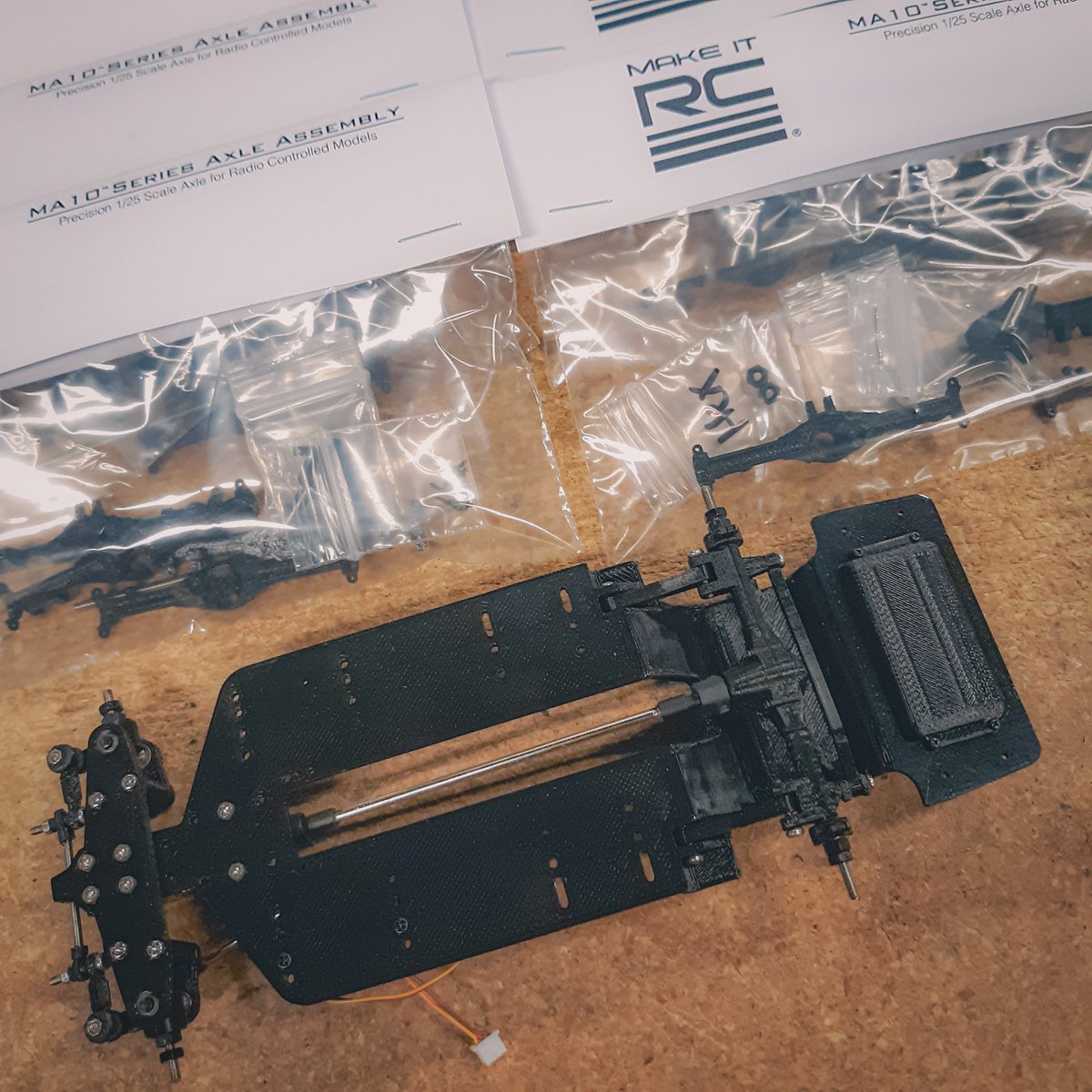 Make_It_RC's tweet photo. Tons and TONS of tiny axles! Well maybe more like grams and grams. 😆  Seriously though all parts have arrived and we're finally able to get some chassis kits packed. As always doing a few test builds to confirm the quality and proper part fitment. https://t.co/tZk3y6YSMU