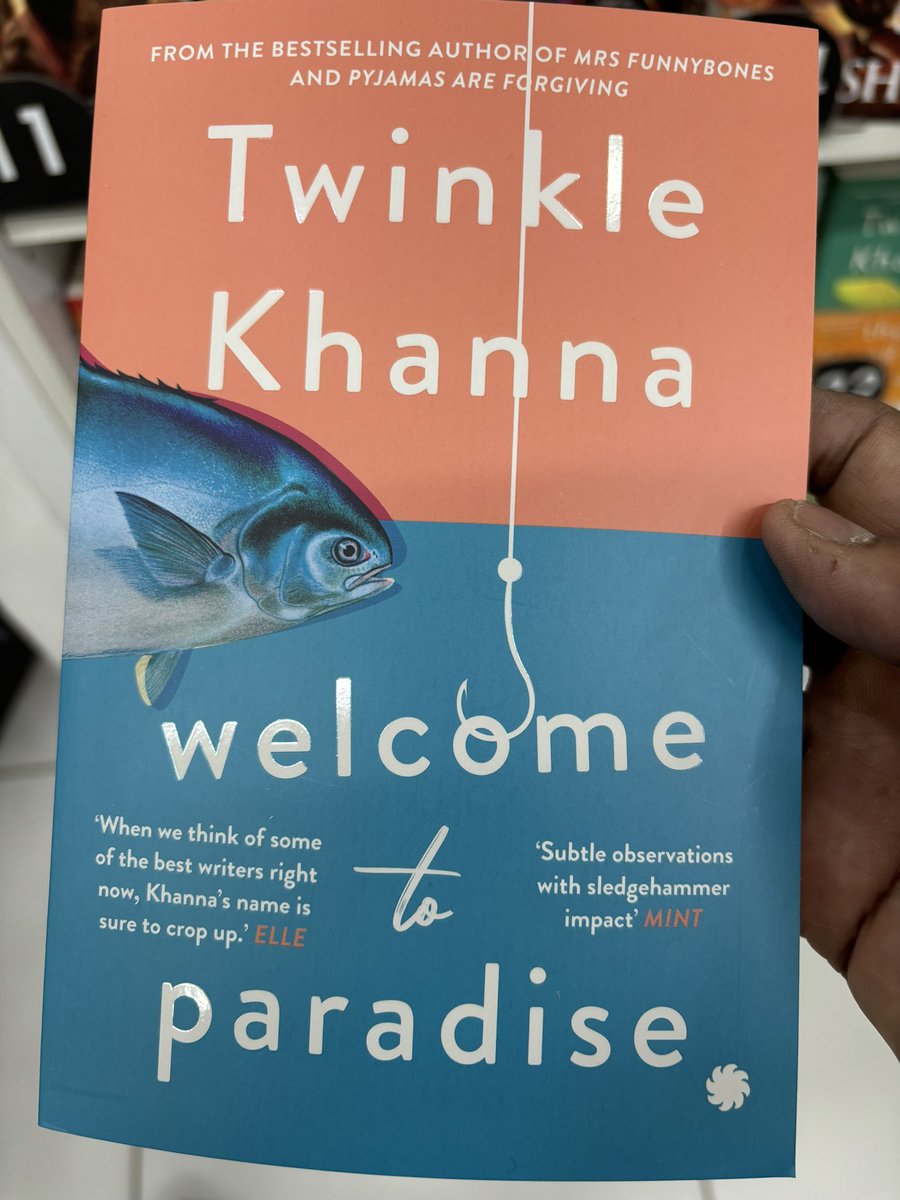 Picked @mrsfunnybones book for a 7AM red eye!! Welcome to Paradise