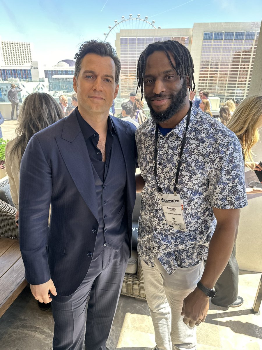henry cavill with a a fan