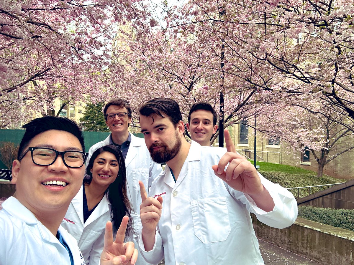 Donning our white coats for picture day! The cherry trees truly make a beautiful backdrop.