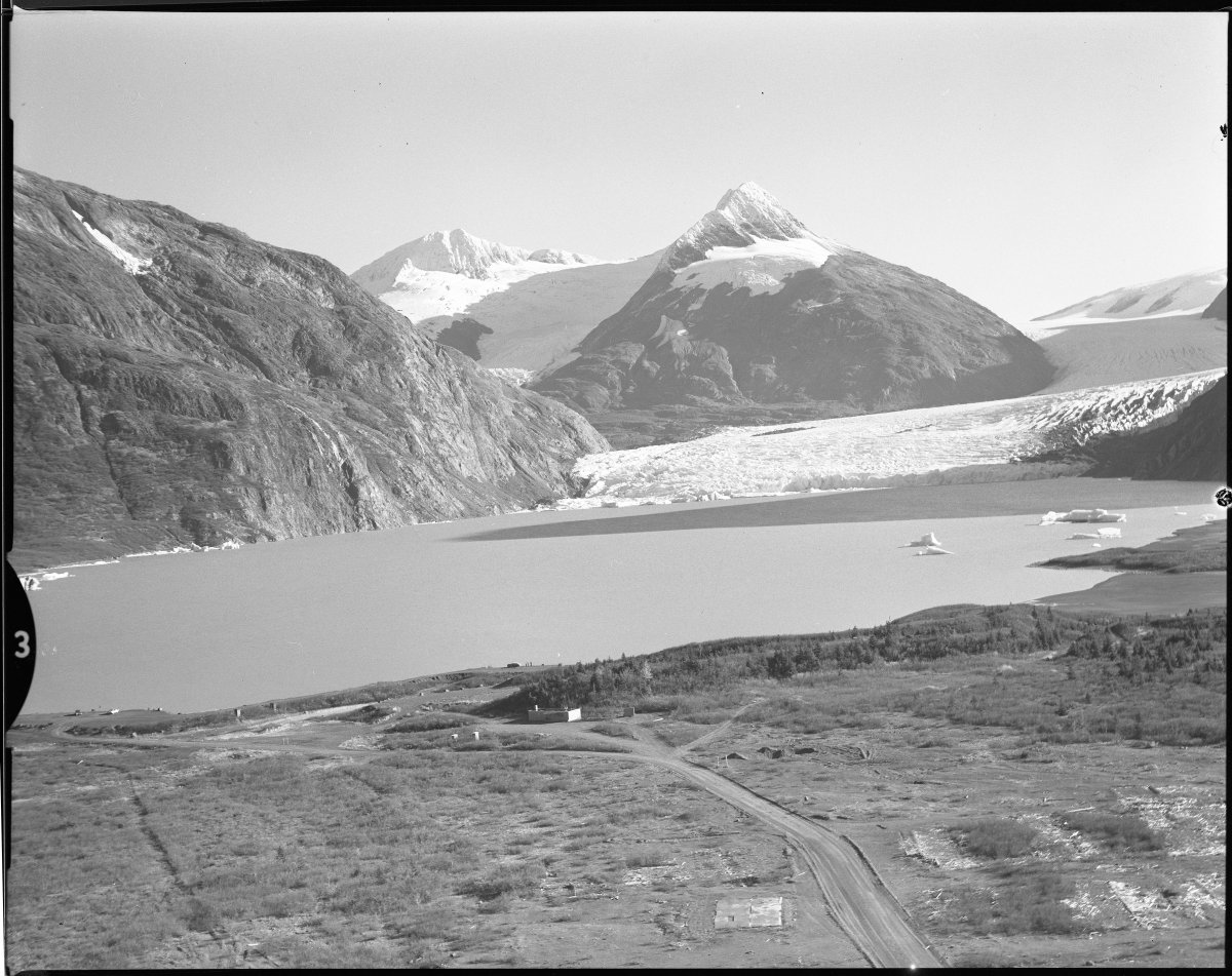 1954 aerial view of Portage Lake and Glacier. Via Anchorage Museum #alaskahistory #alaska #portageglacier