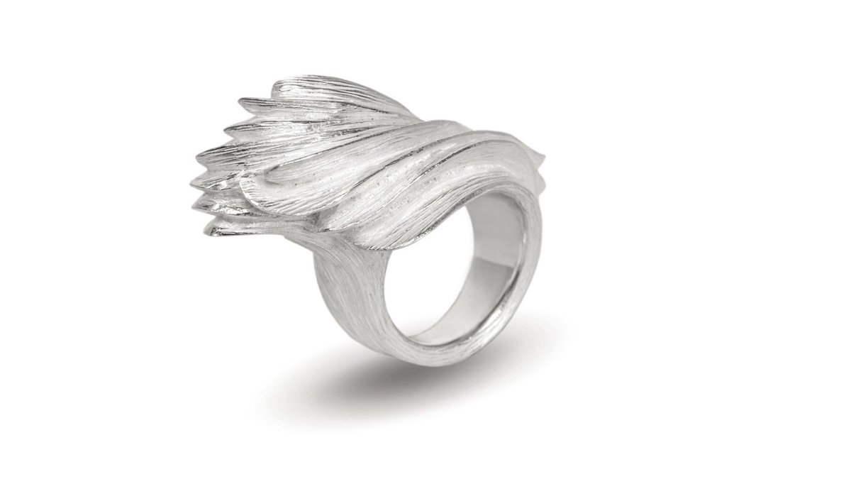 A sculptural showstopper, this gorgeous silver ring designed by @dovileko_ looks like it has a life of its own! Inspired by the dynamic volumes of the sea, her 'Flow' ring echoes the fluidity of ocean waves. It's a piece that is brave and bold made for making a statement.