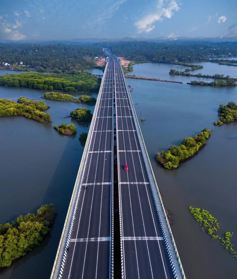 The Thalassery-Mahe bypass. 

Like a skyscraper lying down flat on its side…

At first it looked like a concrete imposition on the natural landscape. 

But it has its own aesthetic. 

And I can’t deny the temptation to cruise down it and appreciate the beauty on either side.