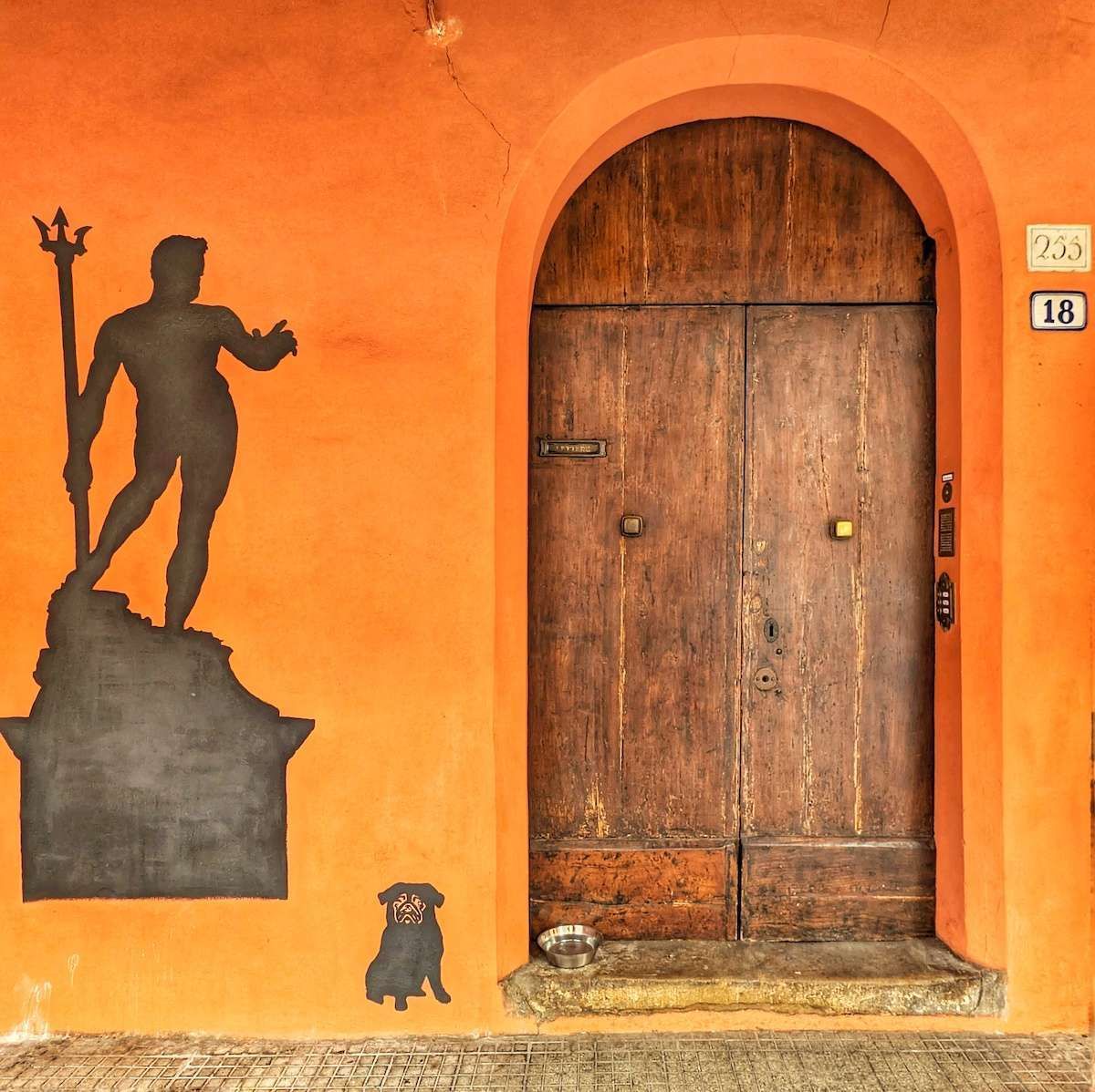 Last week I shared a teaser of my #doorofthemonth. It's time for the big reveal... I found this #door in #Bologna #Italy. That pug! 😍 Reply with your pick for door of the month! 🚪 For more glorious #doors, visit buff.ly/4cRZ4Y0 #DailyDoor #AdoorableThursday