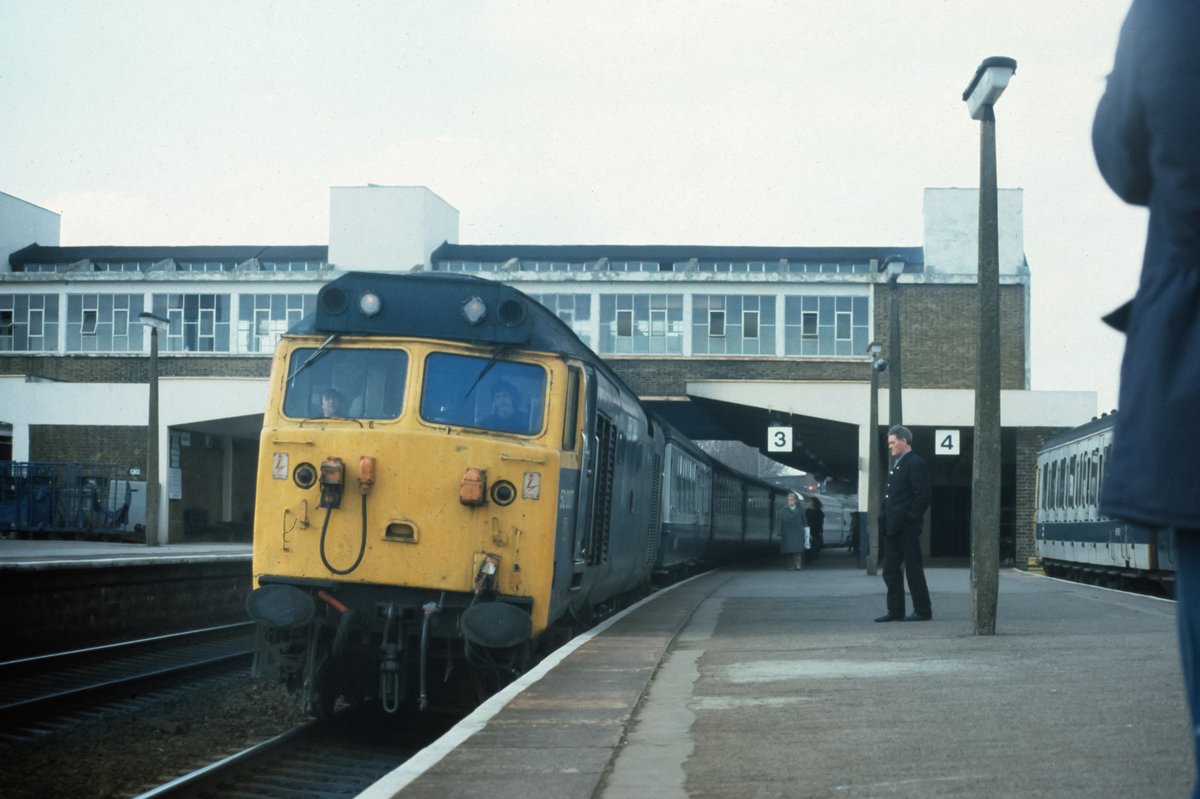 #ThrowbackThursday -3 50007 before its GWR 150 repaint - seen here calling at Banbury on Saturday 17th April 1982 with 1V48, the 1438 Birmingham NS - Paddington, while one of Marylebone's faithful Class 115s awaits passengers for the Chiltern line.