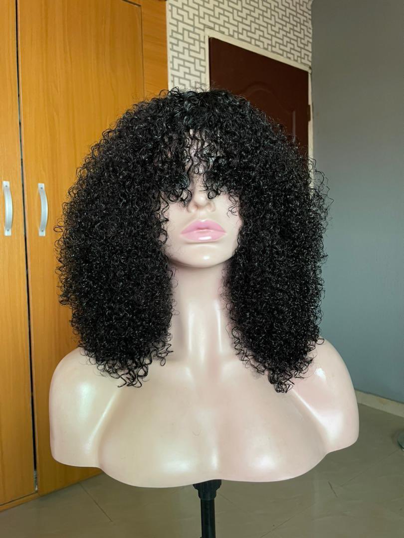 You said you want a short curly fringe wig.. See am here.. Length.. 14inches Grams.. 300g Type.. Sdd eurasian kinky curl Price.. N245,000 (subject to change) Available on pre-order.. You can pay small small too.. Send DM to @Msmenalicious to order.