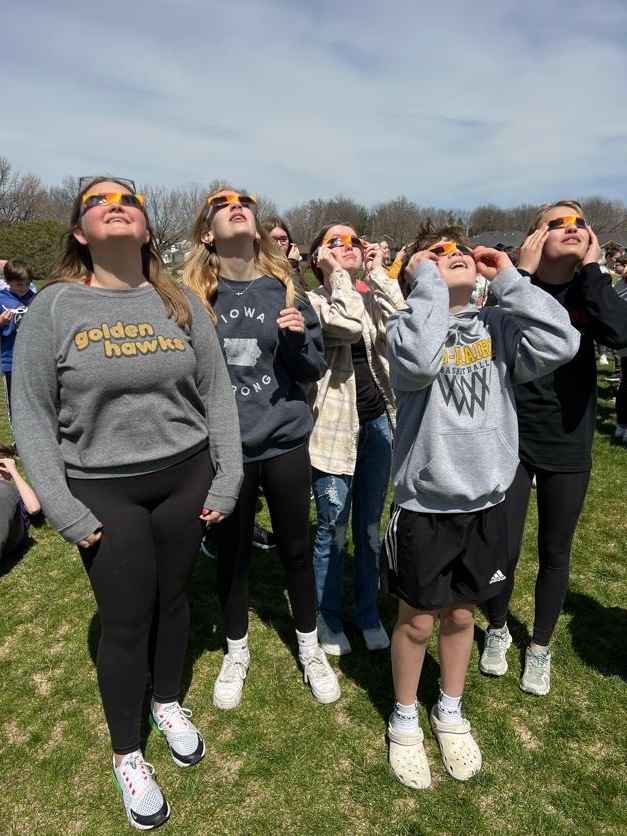 Mid-Prairie Middle School took some time to check out Monday's eclipse with their eclipse glasses at its peak time. It was a very cool sight! #mphawks