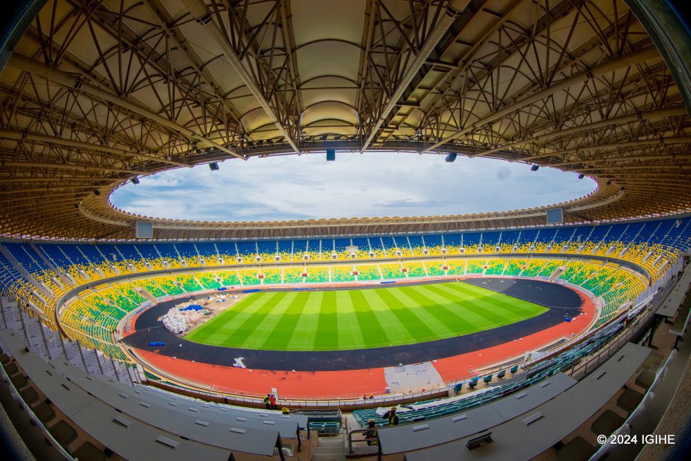 The new Amahoro National Stadium in Rwanda. During the Rwandan Genocide in 1994, it served as camp for some 12,000 mainly Tutsi refugees as seen in the first frame. Marking the 30th anniversary of the genocide, the stadium has undergone a complete renovation making it one of…