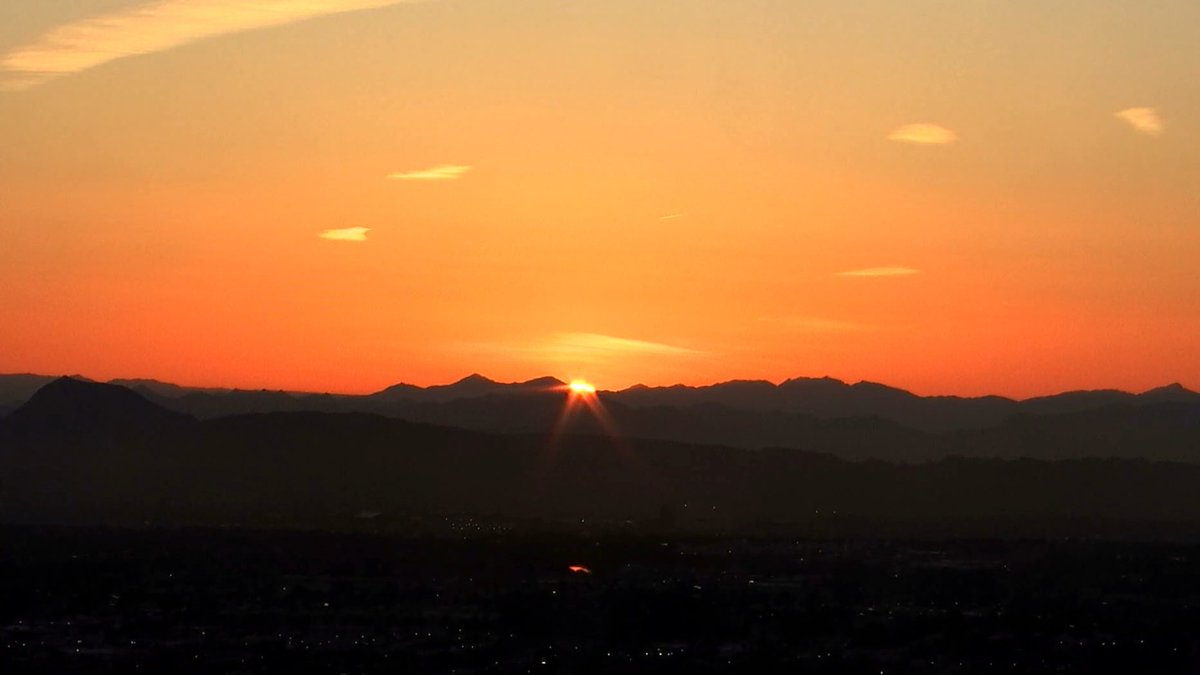 Golden sunrise at 6:15 a.m. in Las Vegas on what will be a sunny, calm, 86° day.