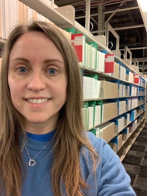 Elissa Lawrence, Depository Coordinator for the State Library of Ohio, poses with the Congressional Hearings, part of the library’s Federal Government information collection containing more than one million publications, dating back to the 1700s. #NationalLibraryWeek…