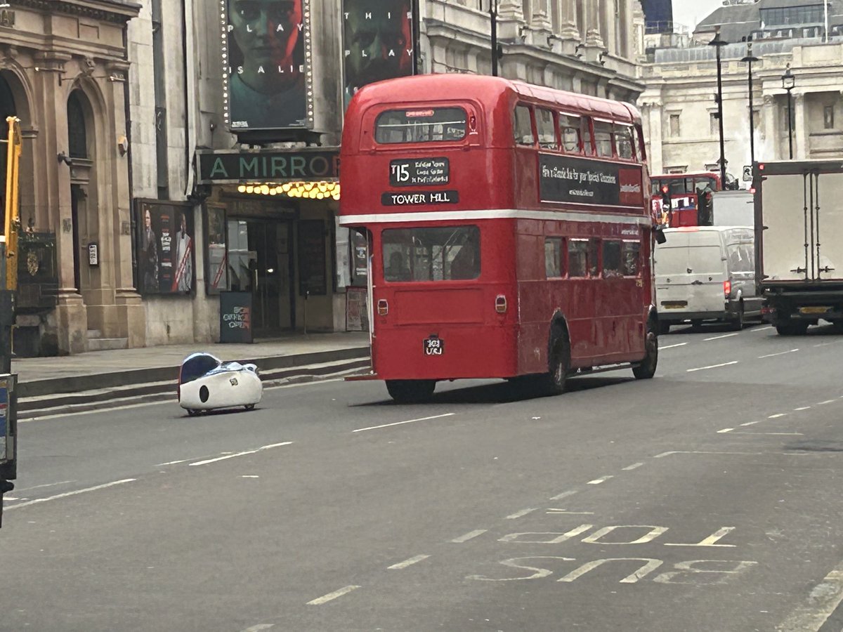 Tiny robot car driving along Whitehall. Anyone know what it is?