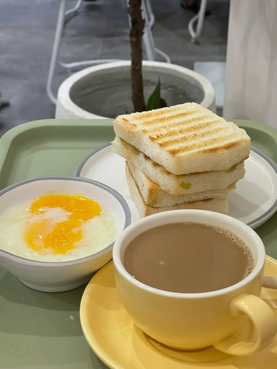 FunmiAdeji's tweet image. Coffee in hand, sandwich on plate, ready to conquer the day! 💪