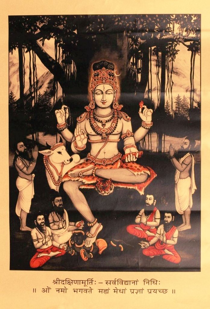 #Dakshinamurty, a form of Shiva, sits under the Banyan tree facing South, known as Dakshina, where he imparts wisdom to all Rishis and the entire world, subduing #Apasmara, the demon of ignorance, under his foot.