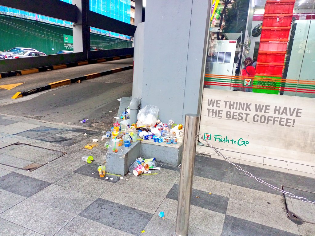 Lack of civic consciousness, lack of bins OR both? I took these pictures at Wisma Central, near KLCC, about an hour ago.