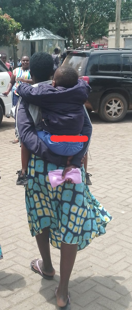 KISORO:Twinomujuni Crescent,a middle class pupil at Bright Valley pre &amp; primary school who was assaulted by her step mum Charity Ninshaba being carried by his teacher <a href="/PoliceUg/">Uganda Police Force</a>
Ninshaba an officer <a href="/UNATU_ORG/">UNATU</a> Kisoro is now in <a href="/PoliceUg/">Uganda Police Force</a> hands with the alleged father of the victim