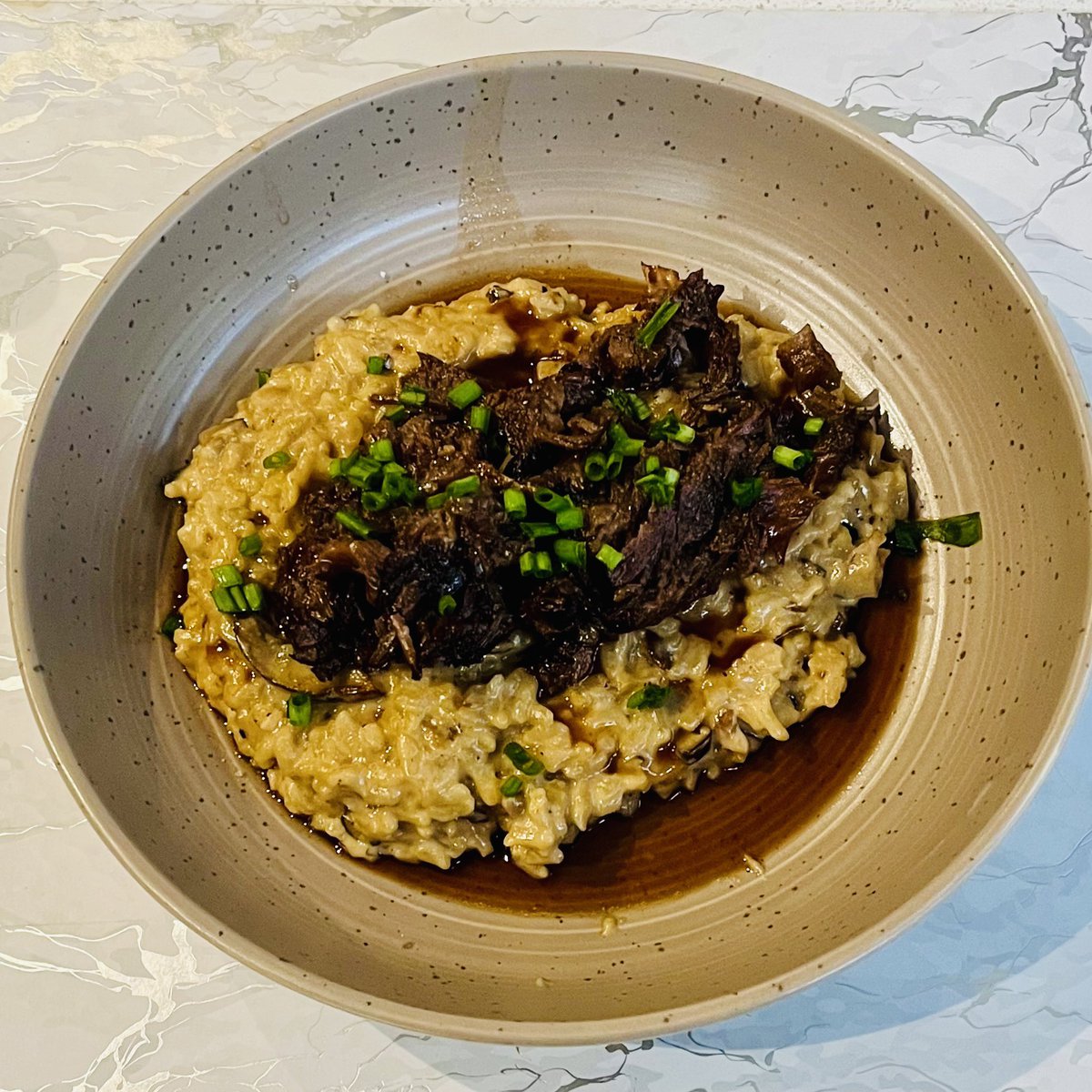 Last night I made Porcini Risotto and Red Wine Braised Short Rib, Enhanced with a Rosemary and Citrus-Infused Merlot Jus.