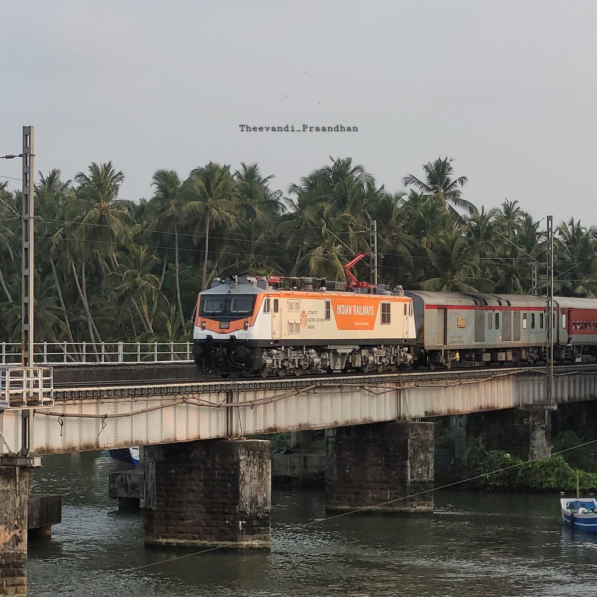 Celebrity loco of Kanpur and second prize winner of the beauty contest... Kanpur WAP7 with 12483 Kochuveli - Amritsar weekly SF Express passing through the beautiful Korapuzha river...💚💚

Awesome Click By: Gokul R

#scenicview #drmpalakkad #Kozhikode 

@GMSRailway @RailMinIndia