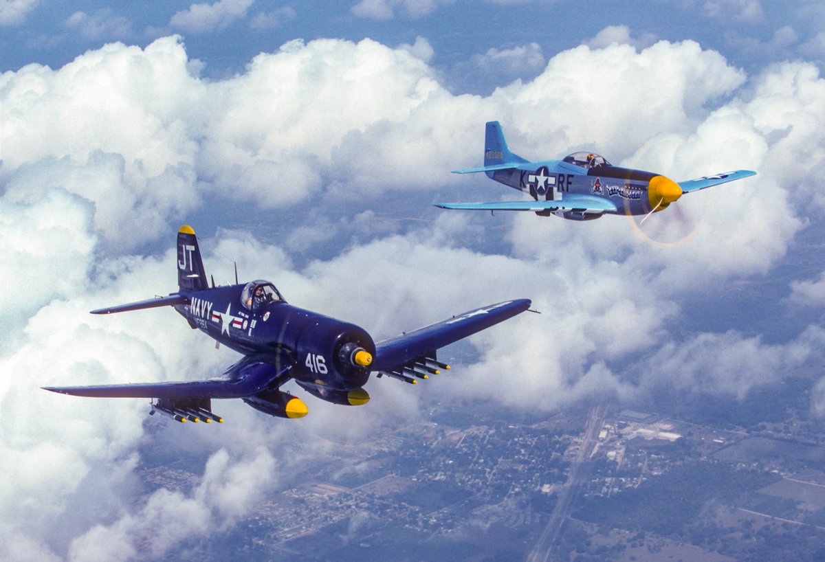 Who's having fun in the sun at SUN 'n FUN? We are joining in with a #TBT from SUN 'n FUN 1992, where Jim Koepnick captured this incredible shot of a Chance Vought Corsair and a P-51 Mustang. What a classic warbird flight! 📷 Jim Koepnick #Aviation #Avgeek #SUNnFUN #Airshow