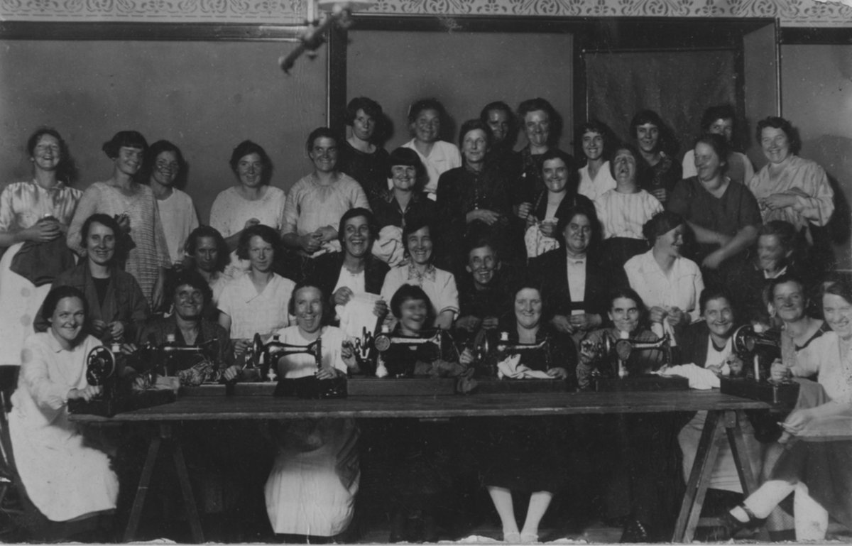 This photograph was taken in 1926. It shows members of the #Treorchy Women’s Sewing Club. It forms part of the records of the Maes-yr-Haf Educational Settlement in #Trealaw You can find out more about the Maes-yr-Haf Settlement in our blog article. bit.ly/49zBY5Q