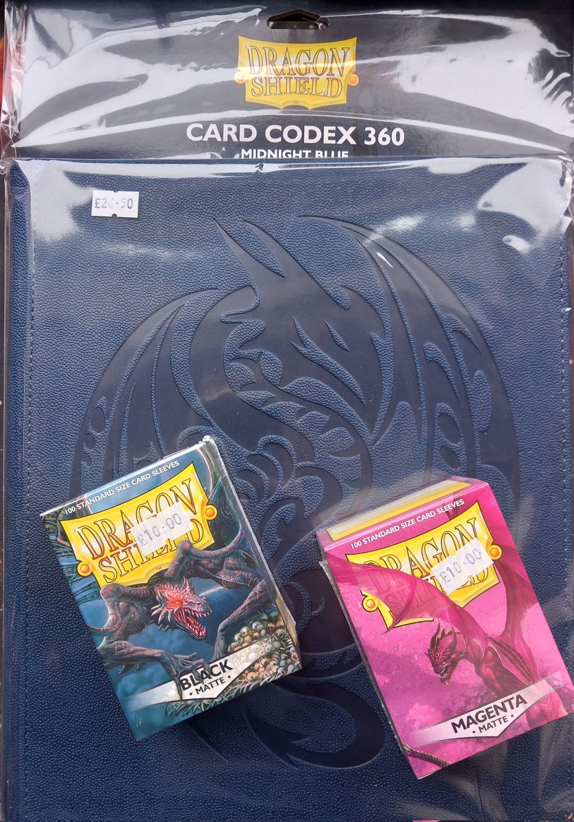 New in from Dragon Shield today... magenta and black sleeves plus card codex 360