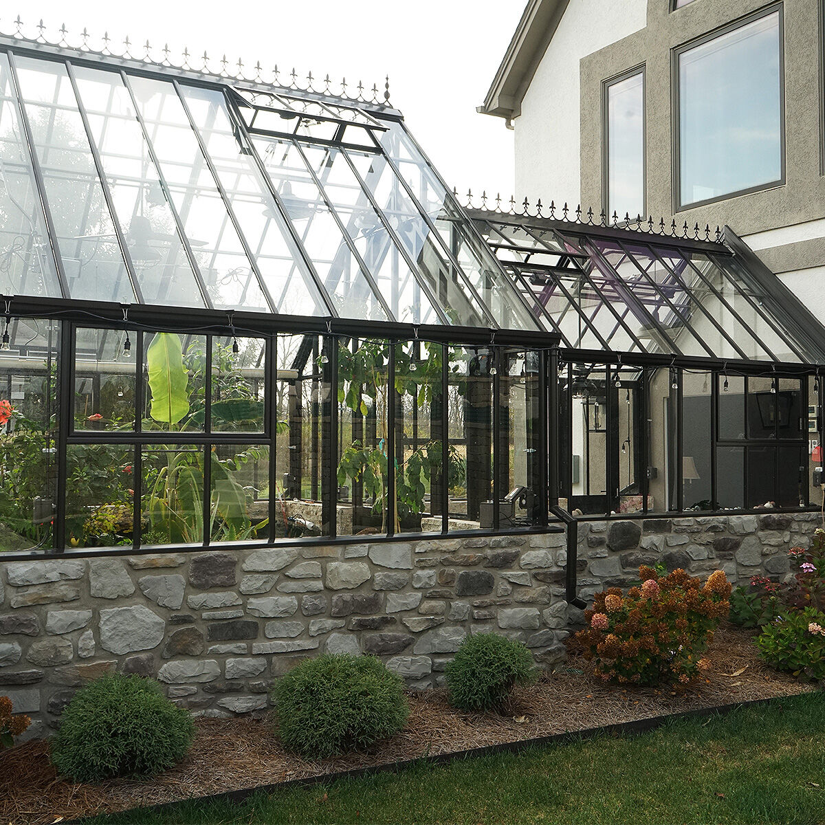The Grand Manor 'meets' the Victorian Classic in the breathtaking form of a Bespoke Glasshouse. Bathed in the rich hues of dark bronze, welcome to a realm where tradition meets innovation, nestled in the serene landscapes of Ohia, USA. bit.ly/2YygHII