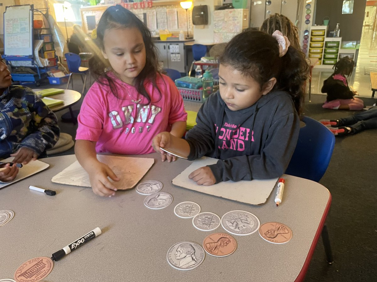 Working with money is always more fun with partners and big coins!🪙<a href="/WinnwoodRocks/">Winnwood Elementary School</a>