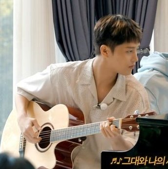 more taeil with guitar please i miss him so much 😭