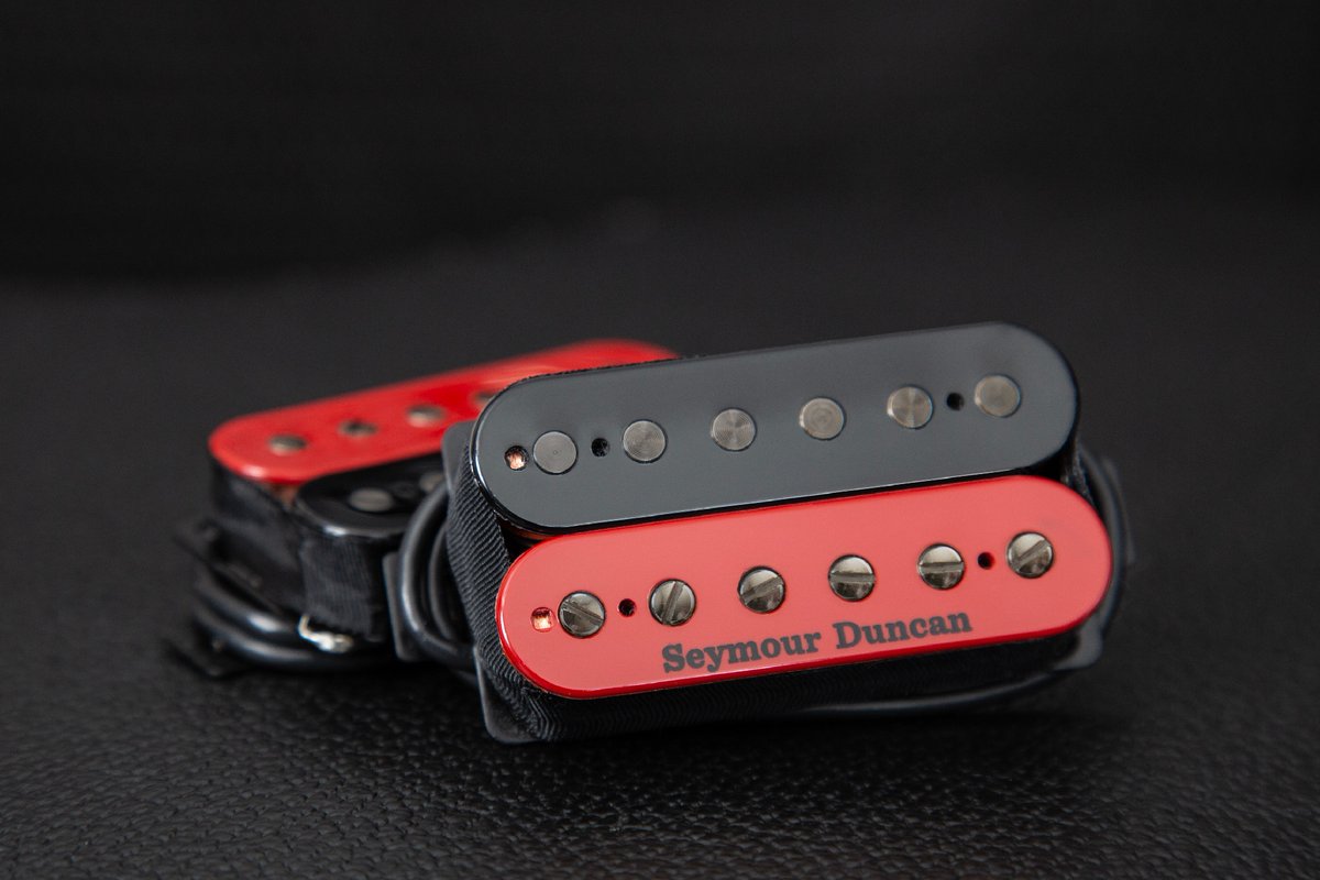 Which of your guitars would look best with that pop of red? The Nazgûl Trembucker and Sentient Set in Black and Red Zebra is available right now via a custom run at @Reverb: hubs.la/Q02sz4wf0 #SeymourDuncan #MetalGuitar