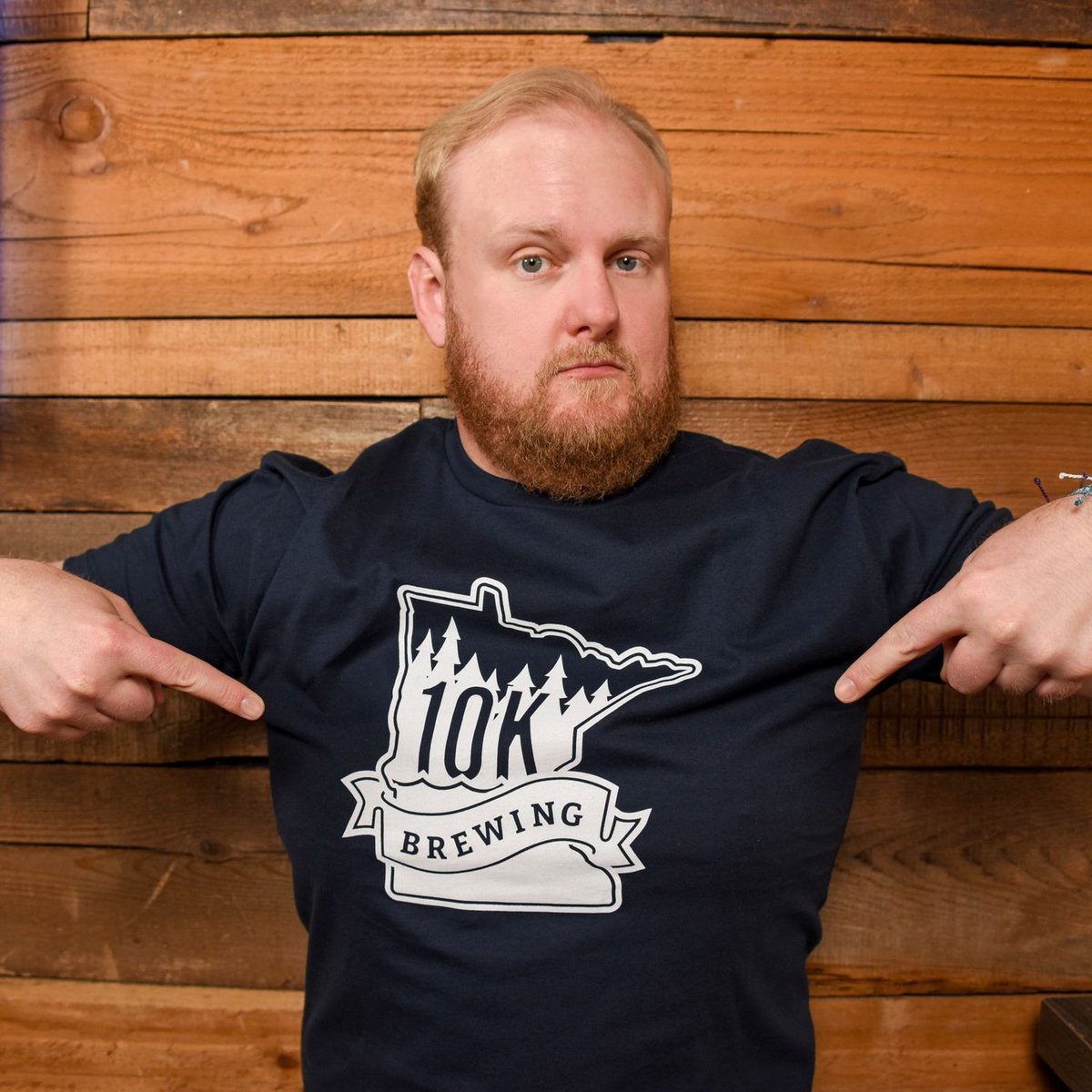 Casey is pointing at his shirt, which says 10K Brewing, where comedy is happening tonight. Follow Casey's instructions and join us in the Empire Room at 7:30 pm for a free comedy show. *doors open at 6:30 pm*