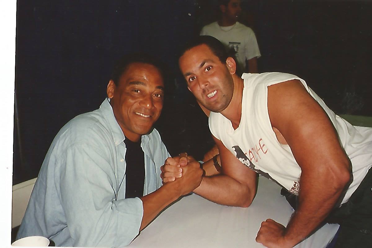 Me and Al Cowlings arm wrestling 1990's, Cowlings drove the White Ford Bronco that had O.J. Simpson in the back seat during the famous car chase from the police on the highway in 1994. @TMZ @OJsimpso32 RIP O.J. Simpson