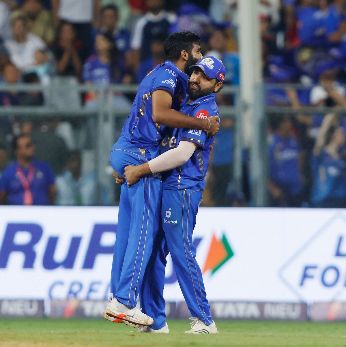 Rohit Sharma hugging Bumrah after a terrific spell. - Frame of the day. ⭐