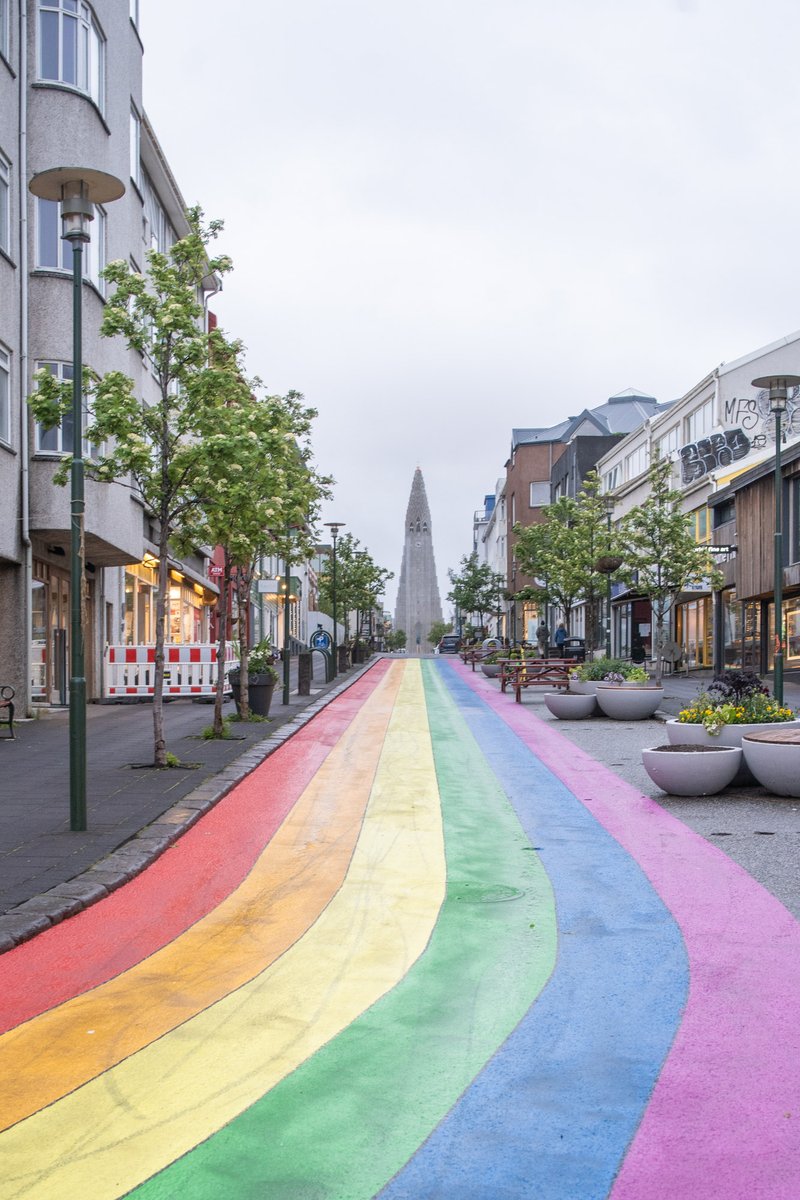The rainbow road in Reykjavik, leading up to the Hallgrímskirkja church.