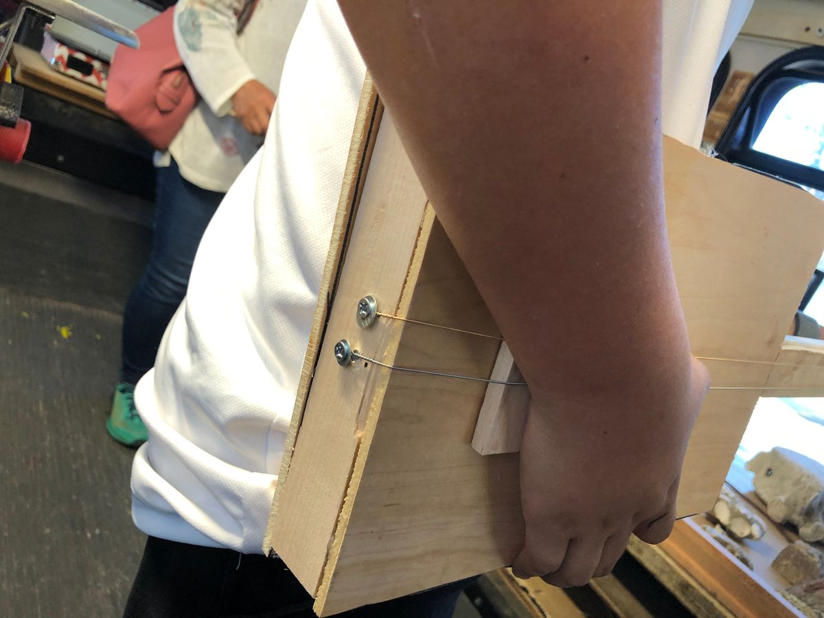 CSWSalinas's tweet photo. A fine guitar took shape at our Salinas Science Workshop on Wheels session outside Steinbeck Library. Exquisite craftsmanship with our rudimentary tools and materials created a remarkably pleasant sound.  
#Toolsinyourhands
#STEM
#STEAM
#LearnByDoing https://t.co/ovVlEArvX7