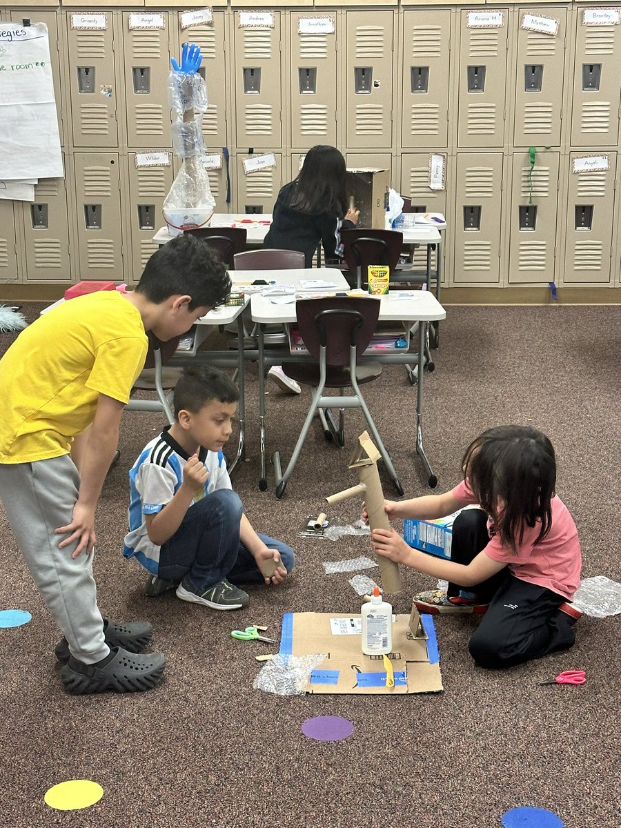 Students working hard in science to create a project based on what they learned about biomimicry &amp; engineering!!!