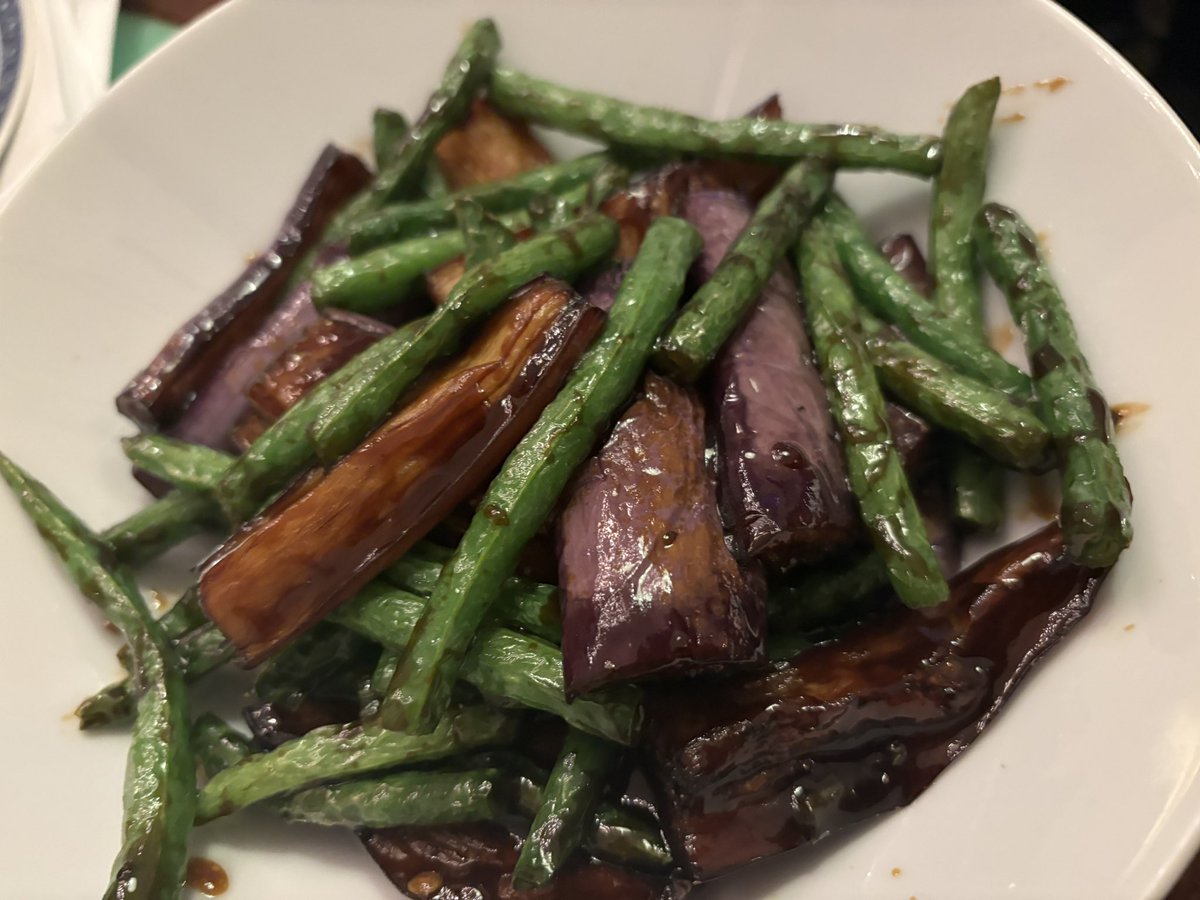 If there is a more beautiful table colour than this in New York City, I haven’t seen it. 💚 at @cafechina_nyc yesterday. Also, the food! Szechuan pickled vegetables, dreamy eggplant (aubergine) with string beans, soup dumplings. And the company of @ericjoonho 💙🙏