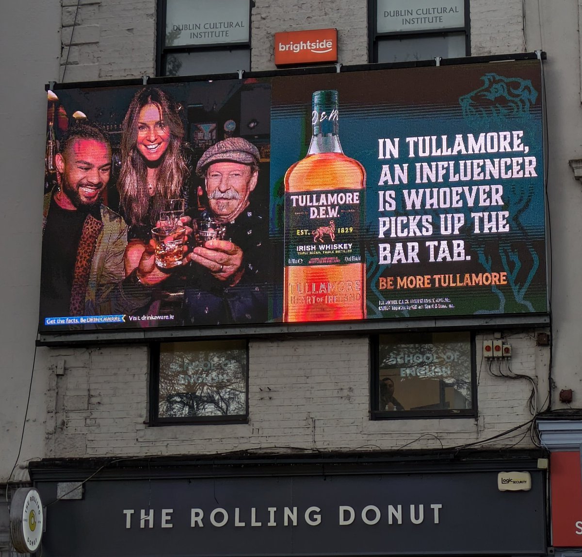 Love the location of the @TullamoreDEW billboard in Dublin...Irish Whiskey and Donuts, the perfect combination!! 🥃🍩😋 #tullamoredew #irishwhiskey #rollingdonut