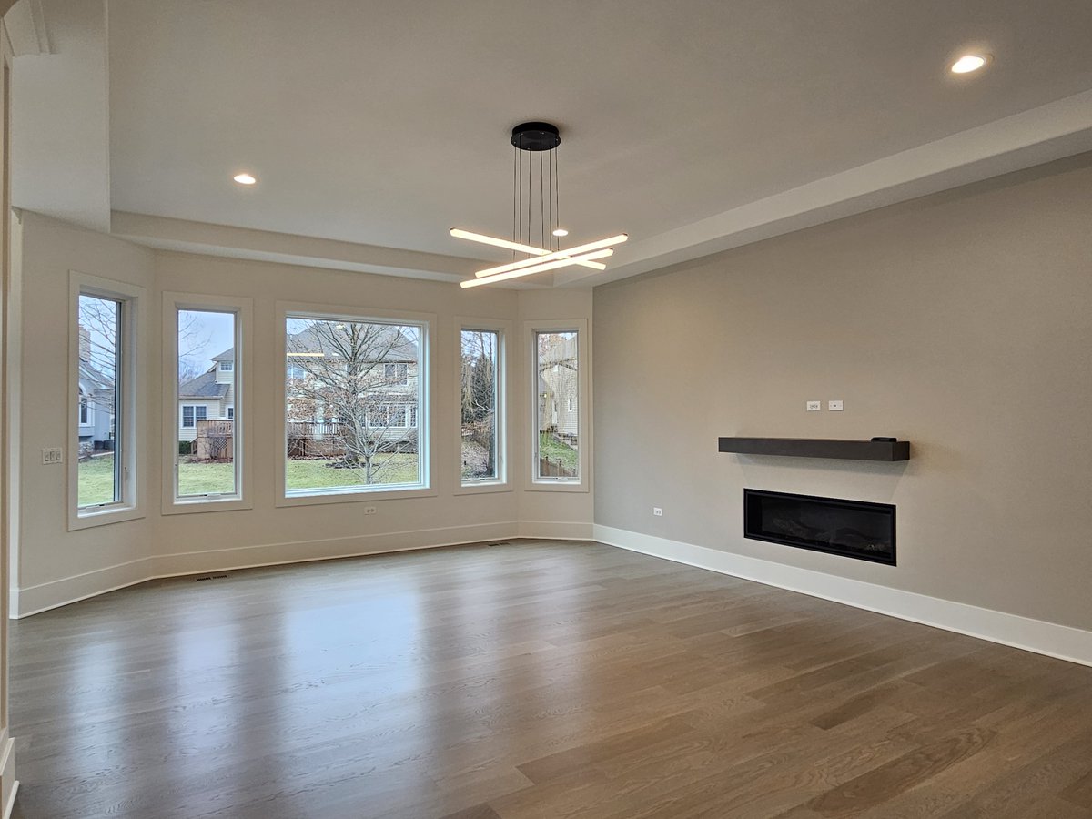 A #familyroom with an amazing view! So light & bright! Our #modelhome is open from 11 am - 5 pm at 4012 Alfalfa Ln #Naperville #newhome #newhomedesign #newhomebuilder #newhomeconstruction #homebuilder #homeconstruction #customhome #customhomebuilder #customhomebuild #newhomebuild