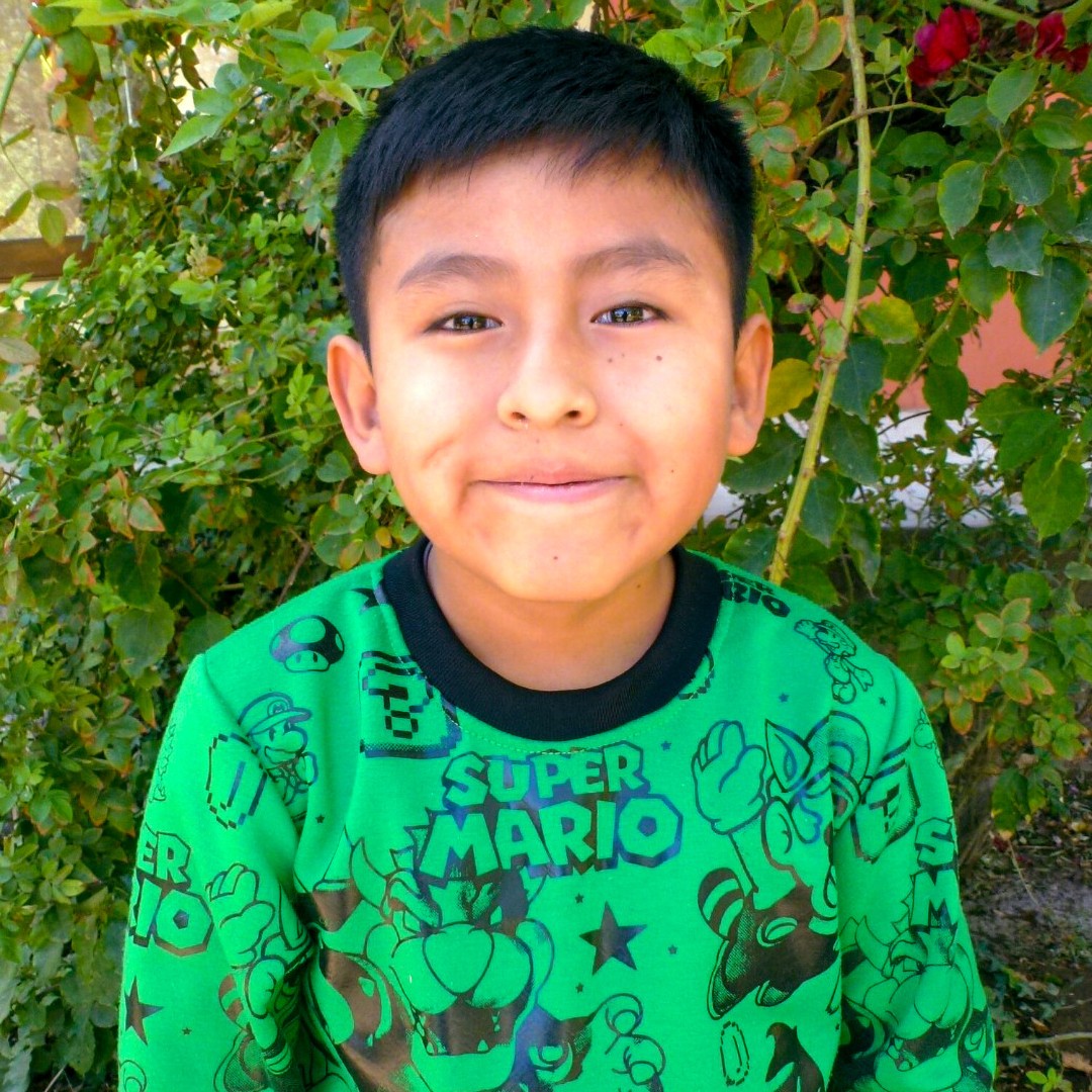 Christopher’s short experience as a child is a bit tragic. His mother passed away during childbirth and his father left him in the care of her wife's parents, Angelica and Felipe. Through sponsorship, his grandparents started to get support for Christopher's education.