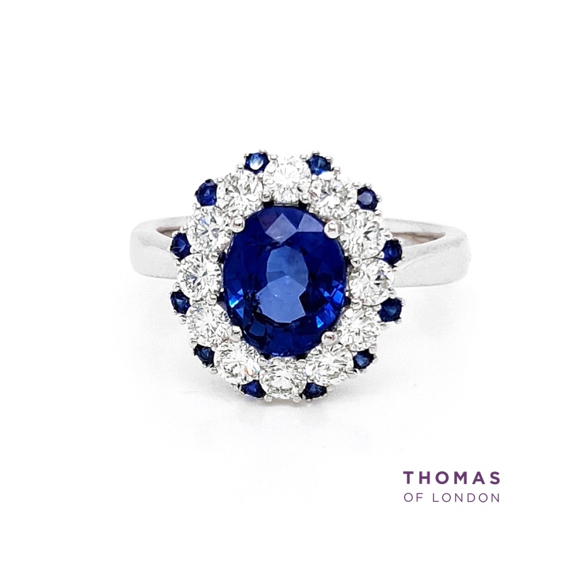 Make a statement with this elegant tanzanite and diamond cluster dress ring accented with round sapphires and crafted in 18ct white gold. thomasoflondon.com/tanzanite-diam… #tanzanite #diamond #dressring #jewellery #thomasoflondon