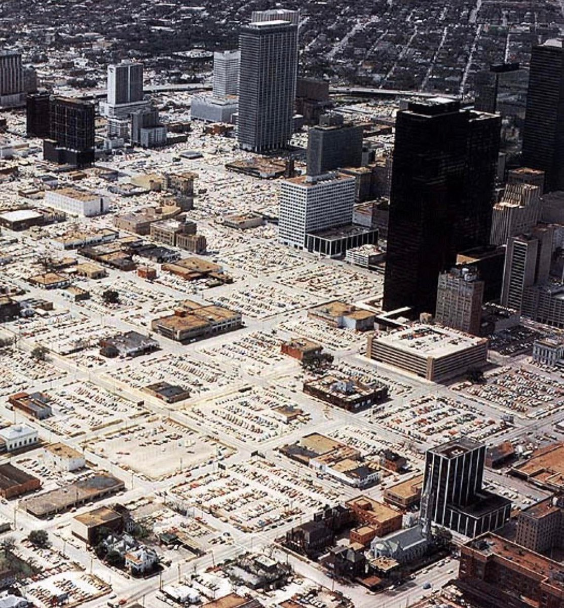 Idk if y'all have seen this photo before... but it's genuinely wild that Downtown Houston used to be a literal parking lot in the 70s.
