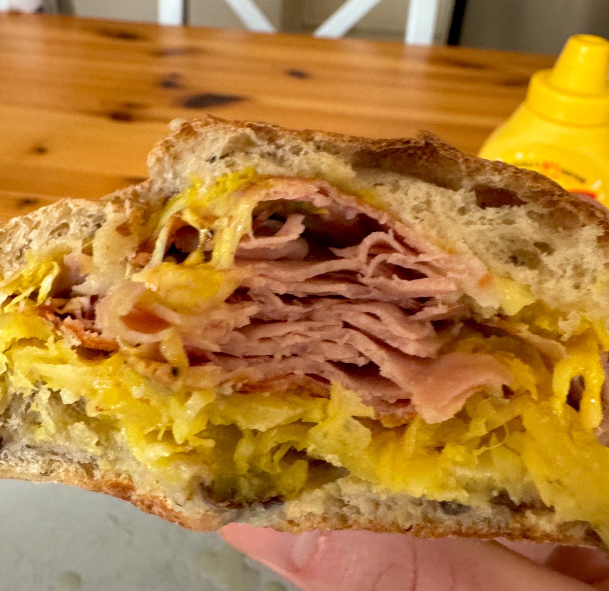 Giving the Anthony Bourdain fried mortadella sandwich a whirl. Stacked up thinly sliced mortadella fried in a pan (get the crispy bits going), melted some Gouda & applewood smoked cheese on top. Added into a ciabatta with @Frenchs mustard. Also added in some mustardy sauerkraut…