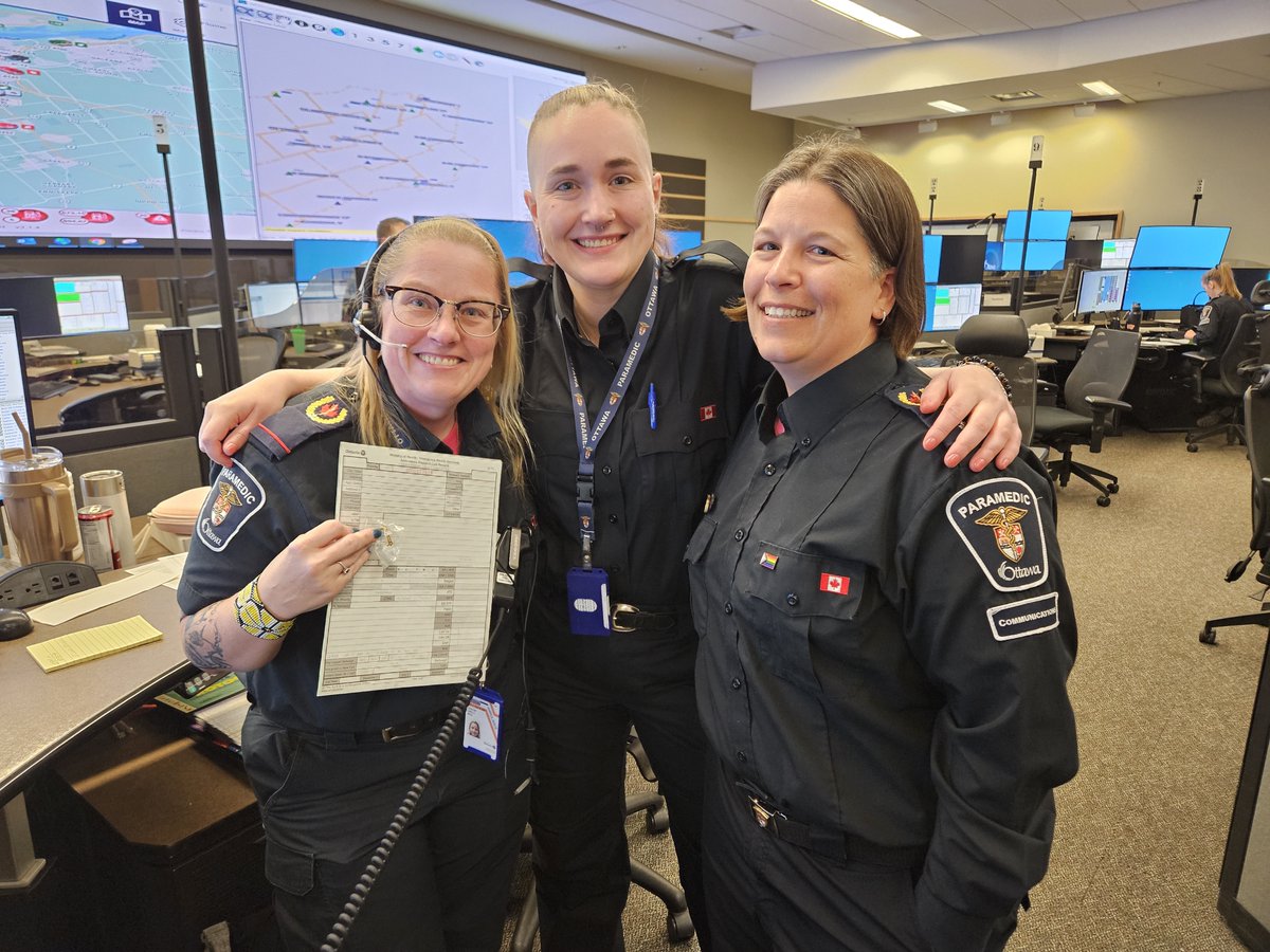 OttawaParamedic's tweet photo. Congratulations to Communications Officer Christine (left) who coached the delivery of a healthy baby boy last night during the transition to MPDS.  Her actions are recognized by a blue stork pin. https://t.co/fjkPT99EPV