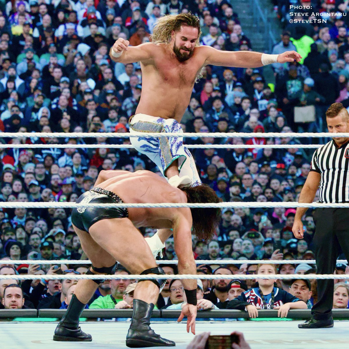The freakin height Seth Rollins gets on this curb stomp.. #WrestleMania