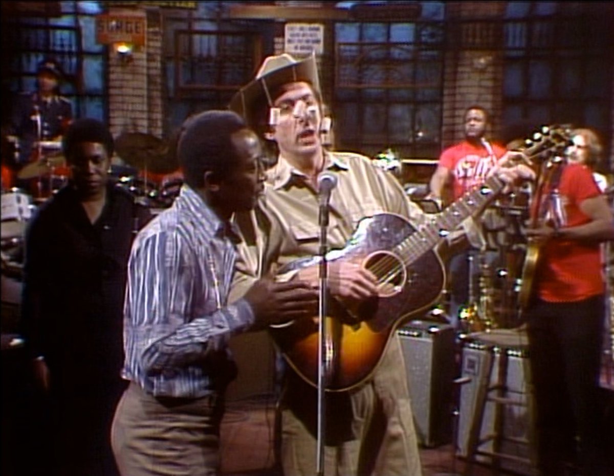 Instead of 'Here Comes The Sun,' @EricIdle sings 'Rover The Drover.'  written by Mr. Idle himself. He is encouraged by Garrett Morris to give way to musical guest Joe Cocker. Saturday Night Live - Season 2, Episode 3 - broadcast on October 2, 1976. @_GarrettMorris @nbcsnl