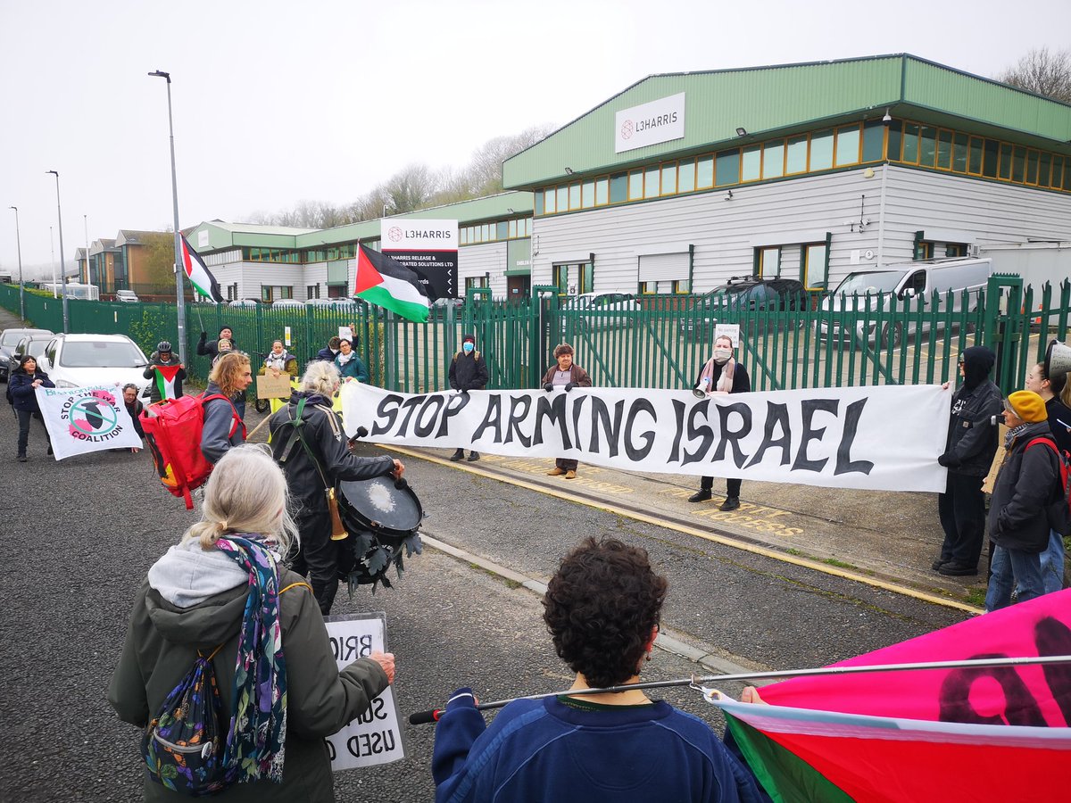 More photos of today's flash demo of Brighton's L3Harris arms factory blocking workers from leaving #StopArmingIsrael