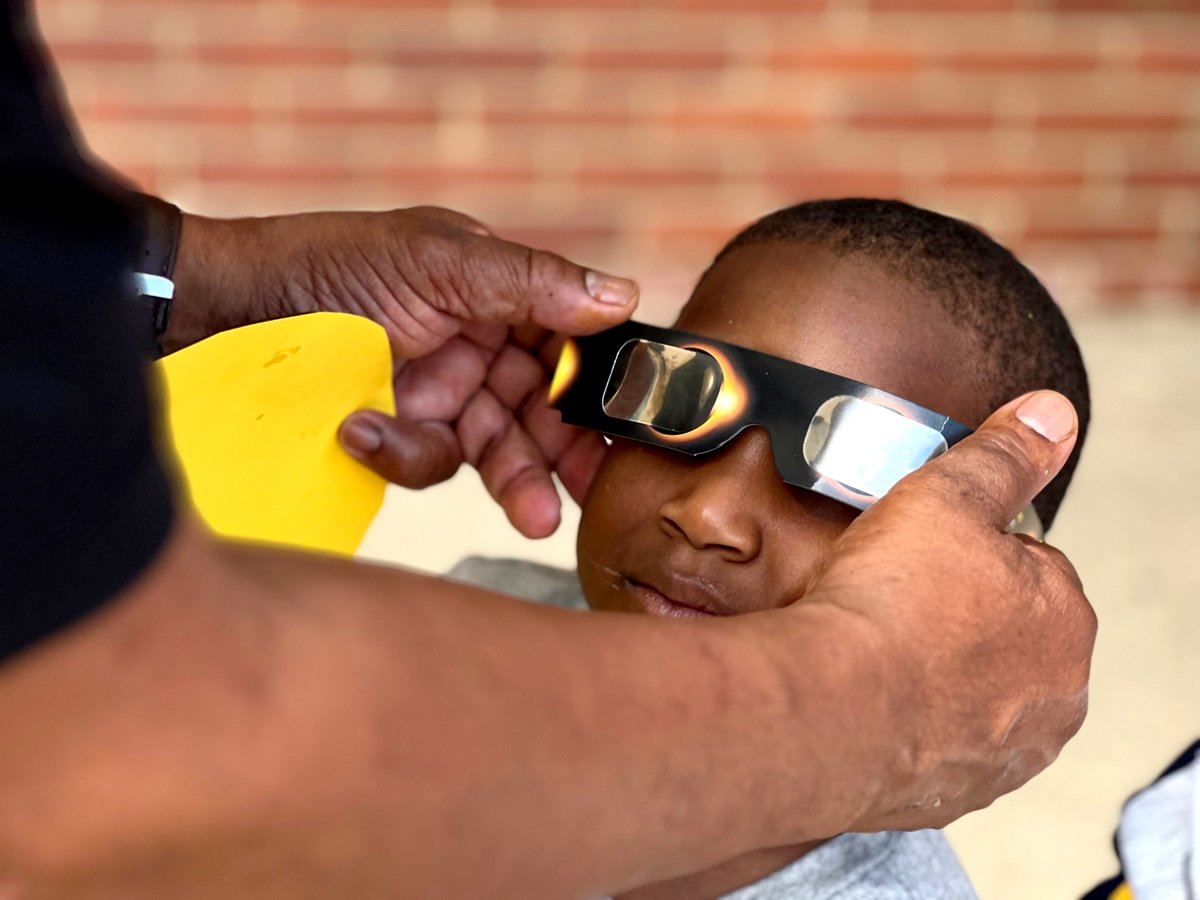 We couldn't resist sharing just one more photo from the LPTM boys' viewing of the solar eclipse! Staff helped all the boys into their safety glasses so they could view the eclipse without harming their eyes.
