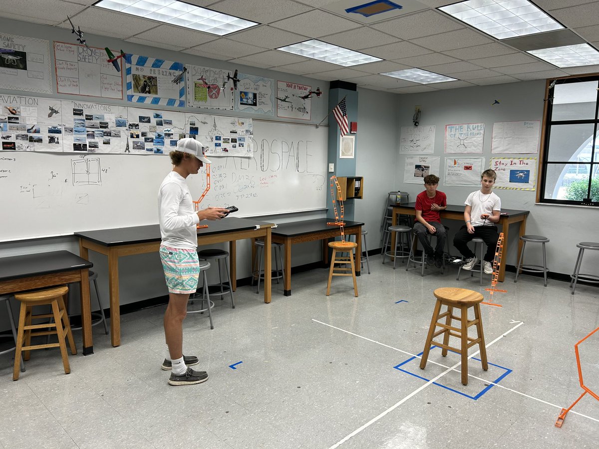 Students in Mr. Anderson’s Aerospace class doing timed drone races on an obstacle course today.